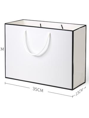 White Cardboard Paper Bag With Black Frame On White Background